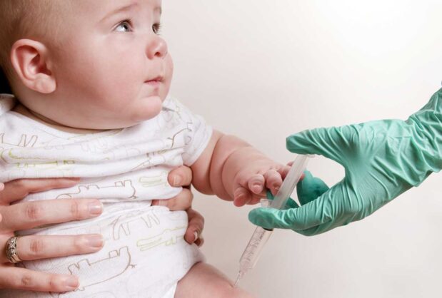 Interview: The Government’s Assault on Our Right to Informed Consent 44 A baby receives an intramuscular vaccination in his right thigh (Public Domain photo by Amanda Mills, CDC, courtesy of Pixnio).