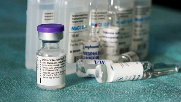 Interview: The Myopic Focus on Mass Vaccination for COVID-19 3 A vial of the Pfizer-BioNTech Covid-19 vaccine (photo by x3/licensed under Pixabay license)