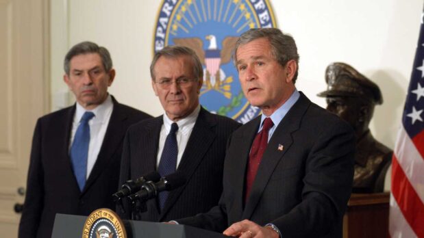 The US Government’s Long History of False Pretexts for War 14 President George W. Bush with neocons Donald Rumsfeld, the Secretary of Defense, and Paul Wolfowitz, the Deputy Secretary of Defense (Department of Defense/Public Domain)